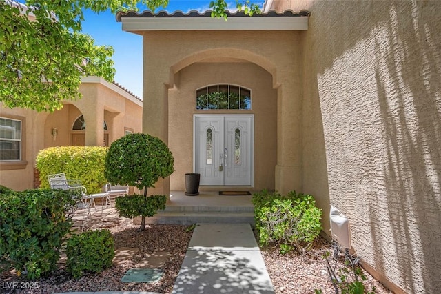 9017 Cotton Rose Way, Las Vegas, NV 89134 - doorway to property featuring stucco siding
