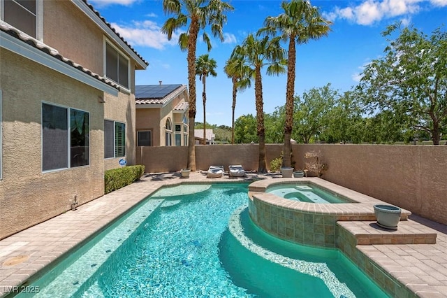 9017 Cotton Rose Way, Las Vegas, NV 89134 - view of pool with a fenced backyard and a pool with connected hot tub