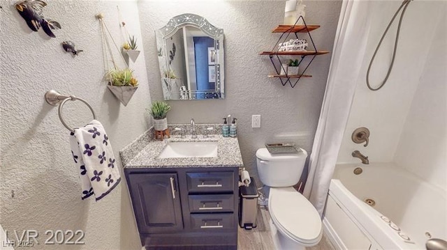 5817 Rae Dr, Las Vegas, NV 89108 - full bathroom featuring a textured wall, toilet, vanity, and shower / bath combination with curtain