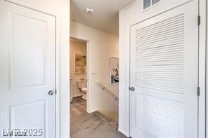 7915 Pandora Sky St Unit 402, North Las Vegas, NV 89084 - hallway with an upstairs landing