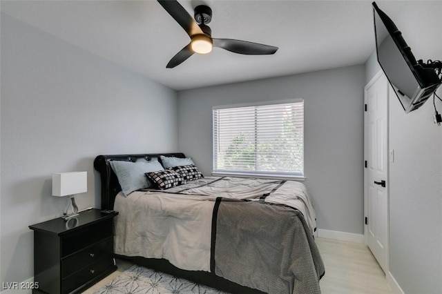 8150 Beaverbrook Way, Las Vegas, NV 89123 - bedroom featuring baseboards, a ceiling fan, and light wood finished floors