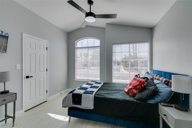 8150 Beaverbrook Way, Las Vegas, NV 89123 - bedroom featuring lofted ceiling, light wood-style flooring, baseboards, and a ceiling fan