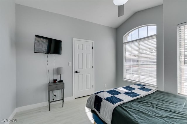 8150 Beaverbrook Way, Las Vegas, NV 89123 - bedroom featuring vaulted ceiling, light wood-type flooring, baseboards, and a ceiling fan