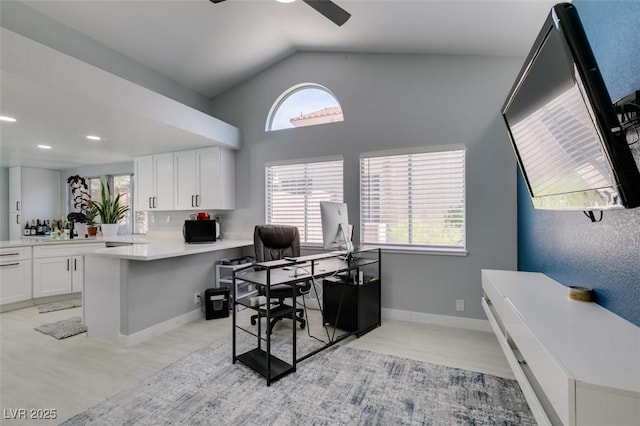 8150 Beaverbrook Way, Las Vegas, NV 89123 - home office featuring a ceiling fan, light wood finished floors, high vaulted ceiling, a sink, and recessed lighting