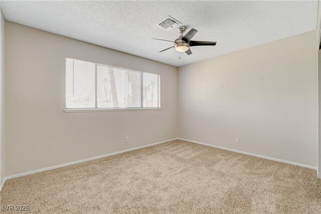7004 Powderhorn Cir, Las Vegas, NV 89128 - carpeted spare room with ceiling fan, a textured ceiling, and baseboards