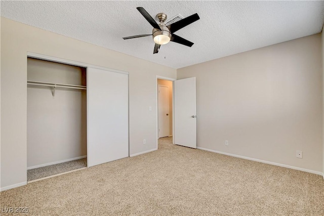 7004 Powderhorn Cir, Las Vegas, NV 89128 - unfurnished bedroom featuring carpet flooring, a closet, baseboards, a textured ceiling, and ceiling fan