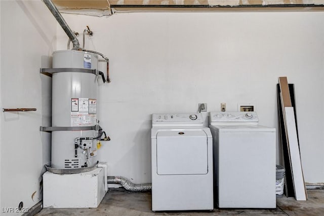 8233 Willeta Ave, Las Vegas, NV 89145 - laundry area with strapped water heater and separate washer and dryer