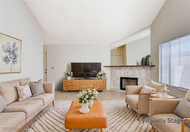 8233 Willeta Ave, Las Vegas, NV 89145 - living area with light tile patterned flooring and a premium fireplace