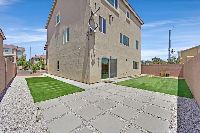 6507 Creekside Cellars Ct, Las Vegas, NV 89139 - back of property featuring stucco siding and a patio area