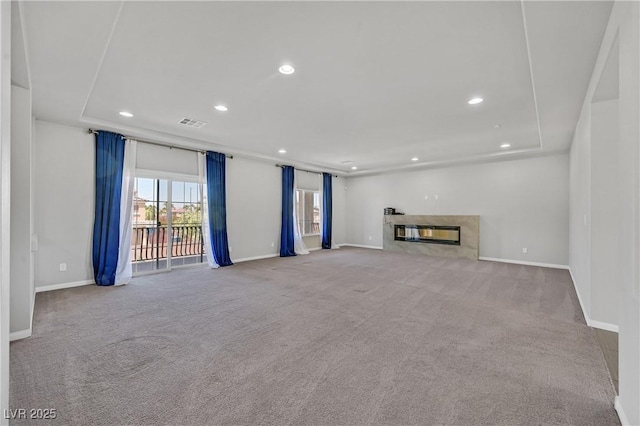 6507 Creekside Cellars Ct, Las Vegas, NV 89139 - unfurnished living room featuring baseboards, carpet, recessed lighting, and a high end fireplace