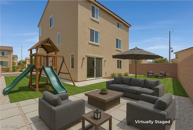6507 Creekside Cellars Ct, Las Vegas, NV 89139 - rear view of house with outdoor lounge area, a playground, and stucco siding
