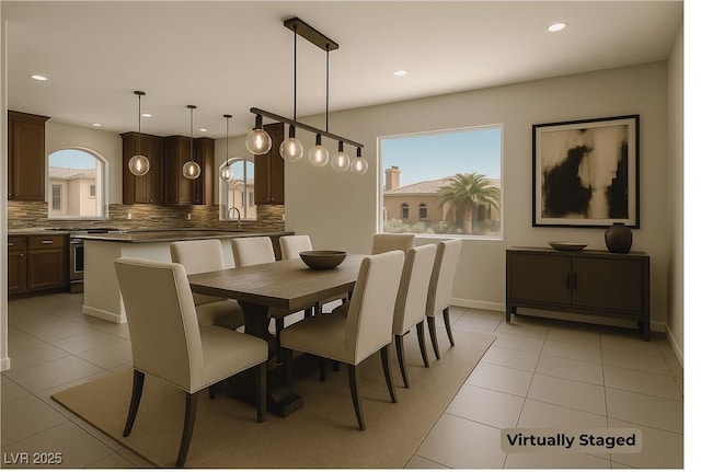 6507 Creekside Cellars Ct, Las Vegas, NV 89139 - dining area featuring light tile patterned flooring, recessed lighting, and baseboards