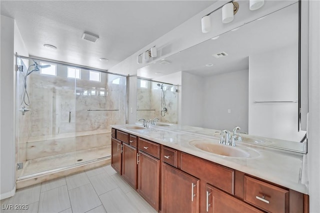 6507 Creekside Cellars Ct, Las Vegas, NV 89139 - bathroom with double vanity, a shower stall, and tile patterned floors