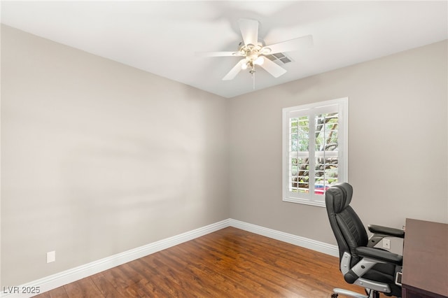 900 Cantura Mills Rd, Henderson, NV 89052 - home office with baseboards, a ceiling fan, and wood finished floors