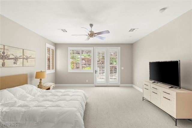900 Cantura Mills Rd, Henderson, NV 89052 - bedroom featuring access to exterior, light colored carpet, baseboards, and a ceiling fan