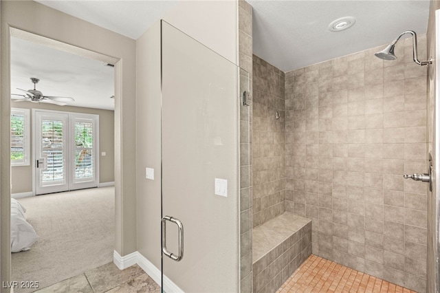 900 Cantura Mills Rd, Henderson, NV 89052 - full bathroom with a stall shower, ceiling fan, tile patterned floors, baseboards, and connected bathroom