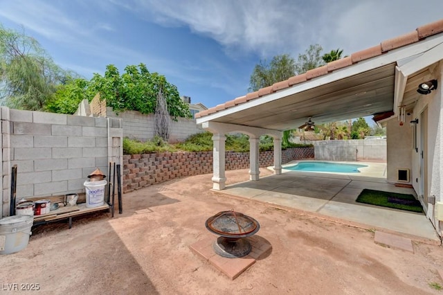 1523 Silver Point Ave, Las Vegas, NV 89123 - fenced backyard featuring an outdoor fire pit and a patio