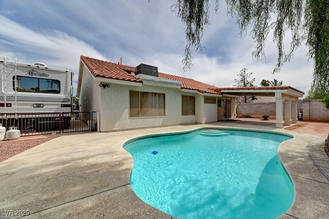 1523 Silver Point Ave, Las Vegas, NV 89123 - rear view of property featuring a tiled roof, a patio, stucco siding, and ceiling fan