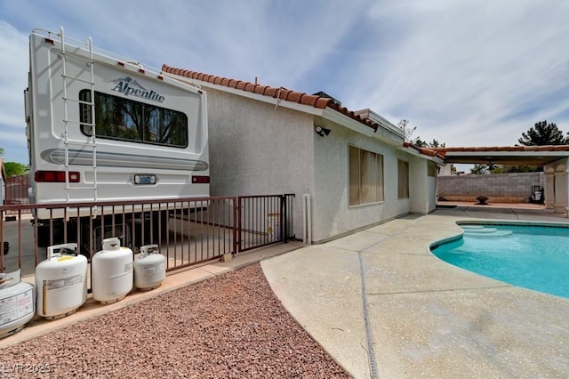 1523 Silver Point Ave, Las Vegas, NV 89123 - back of property with a patio, a tile roof, and stucco siding