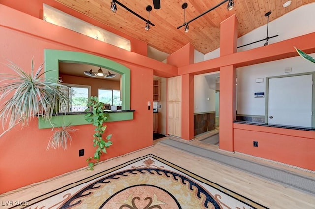 1523 Silver Point Ave, Las Vegas, NV 89123 - hallway featuring wood ceiling, track lighting, and vaulted ceiling