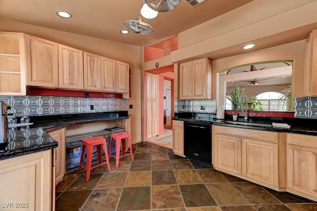 1523 Silver Point Ave, Las Vegas, NV 89123 - kitchen with dishwasher, light brown cabinetry, backsplash, and recessed lighting