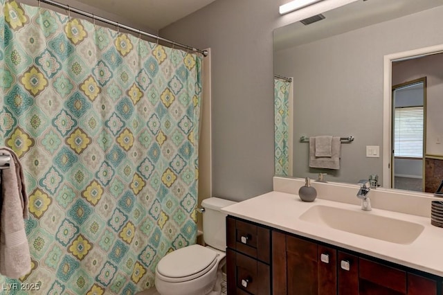1523 Silver Point Ave, Las Vegas, NV 89123 - full bathroom featuring toilet, vanity, and a shower with curtain