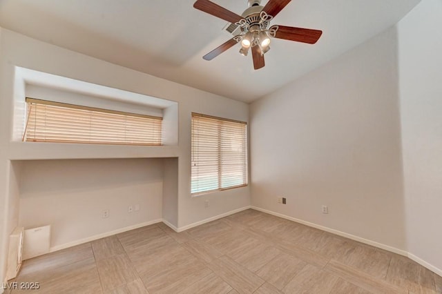 1523 Silver Point Ave, Las Vegas, NV 89123 - empty room with baseboards and ceiling fan
