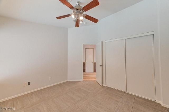 1523 Silver Point Ave, Las Vegas, NV 89123 - unfurnished bedroom featuring baseboards, a closet, and a ceiling fan