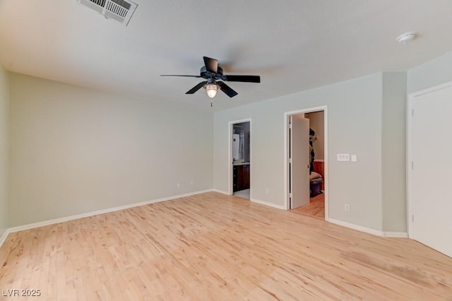 1523 Silver Point Ave, Las Vegas, NV 89123 - empty room featuring light wood-style floors, ceiling fan, a smoke detector, and baseboards