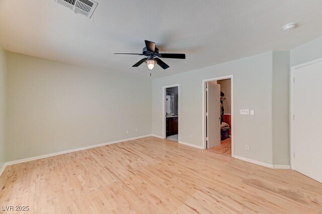 1523 Silver Point Ave, Las Vegas, NV 89123 - empty room with light wood-style floors, ceiling fan, and a smoke detector