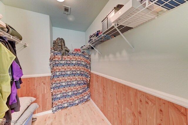 1523 Silver Point Ave, Las Vegas, NV 89123 - spacious closet featuring wood finished floors