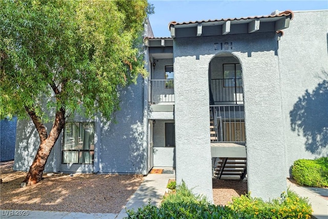 5191 Caliente St Unit 84, Las Vegas, NV 89119 - view of property featuring stairway