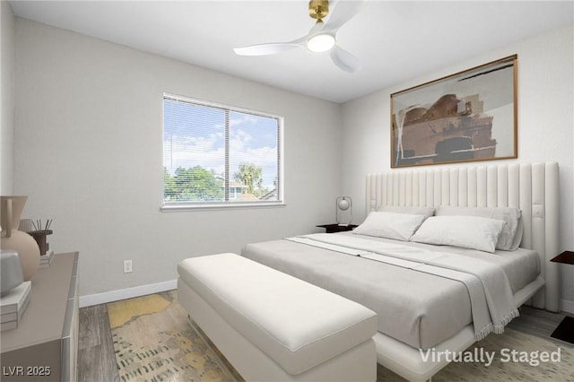 5191 Caliente St Unit 84, Las Vegas, NV 89119 - bedroom featuring light wood finished floors, baseboards, and ceiling fan
