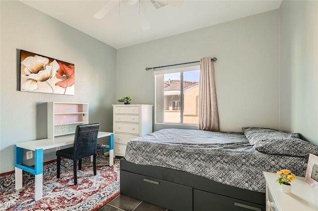 6321 Rolling Rose St Unit 201, North Las Vegas, NV 89081 - bedroom with a ceiling fan and dark tile patterned floors