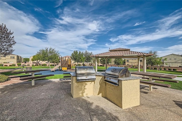 6321 Rolling Rose St Unit 201, North Las Vegas, NV 89081 - view of patio with a gazebo and exterior kitchen