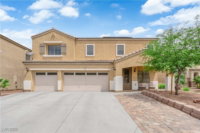 1808 Peyton Stewart Ct, North Las Vegas, NV 89086 - view of front of house with a garage, driveway, stucco siding, and a tile roof