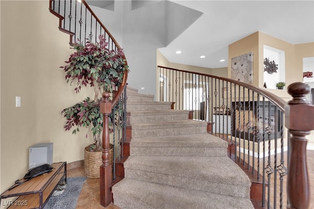 1808 Peyton Stewart Ct, North Las Vegas, NV 89086 - staircase with recessed lighting and a towering ceiling
