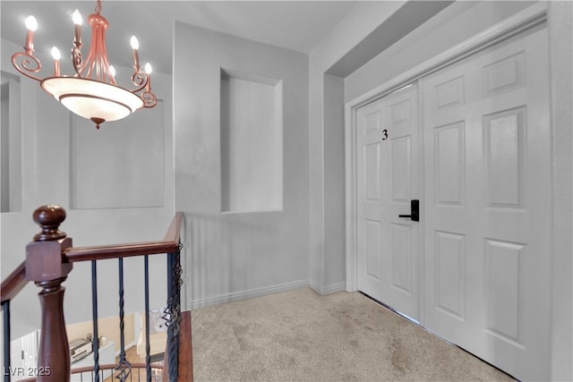 1808 Peyton Stewart Ct, North Las Vegas, NV 89086 - corridor featuring carpet flooring, baseboards, and a chandelier