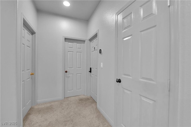 1808 Peyton Stewart Ct, North Las Vegas, NV 89086 - hall featuring light carpet, baseboards, and recessed lighting