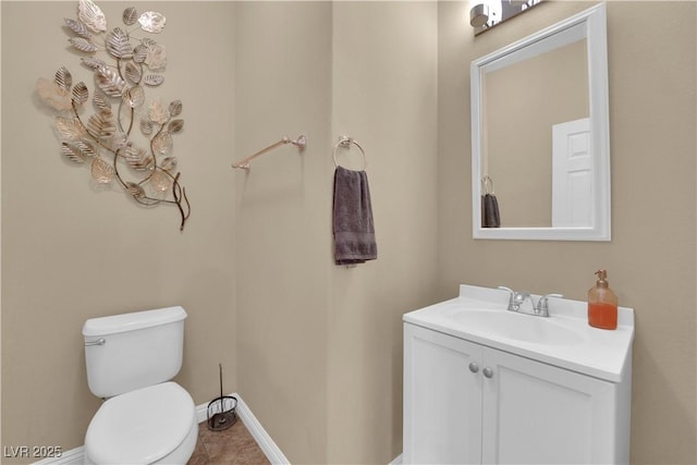 1808 Peyton Stewart Ct, North Las Vegas, NV 89086 - half bathroom featuring vanity, toilet, and baseboards