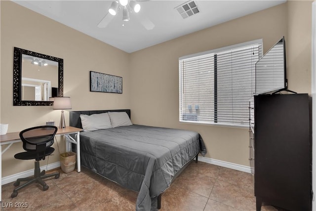 1808 Peyton Stewart Ct, North Las Vegas, NV 89086 - bedroom with baseboards, tile patterned flooring, and a ceiling fan