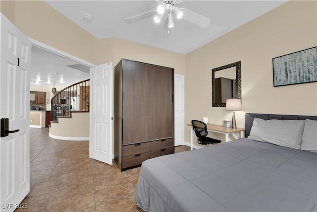 1808 Peyton Stewart Ct, North Las Vegas, NV 89086 - bedroom featuring light tile patterned flooring, baseboards, and a ceiling fan