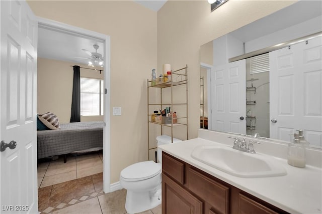 1808 Peyton Stewart Ct, North Las Vegas, NV 89086 - ensuite bathroom with vanity, toilet, tile patterned floors, ceiling fan, and a shower