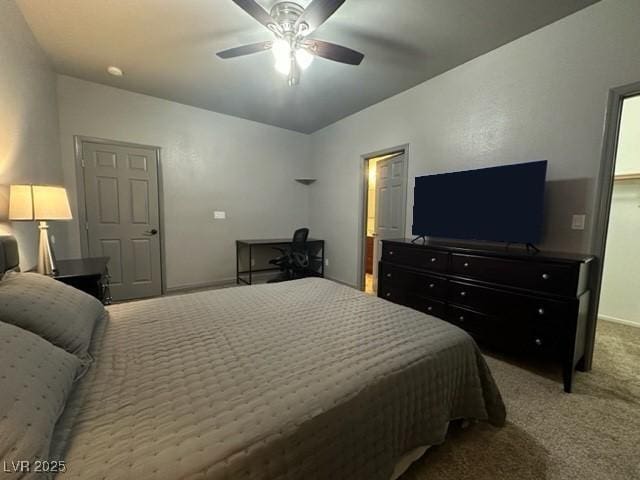 1808 Peyton Stewart Ct, North Las Vegas, NV 89086 - carpeted bedroom with a desk, a ceiling fan, and baseboards