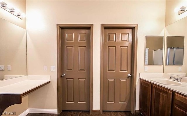 1808 Peyton Stewart Ct, North Las Vegas, NV 89086 - full bath with vanity, baseboards, and wood finished floors