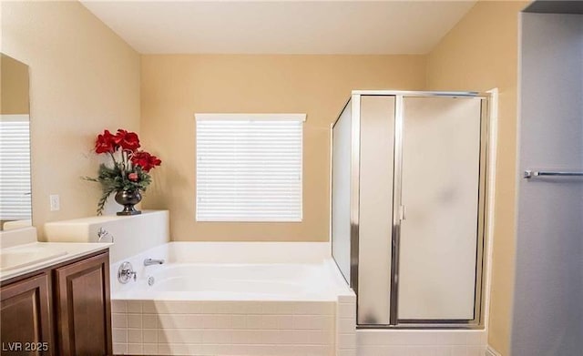 1808 Peyton Stewart Ct, North Las Vegas, NV 89086 - bathroom with a shower stall, vanity, and a garden tub