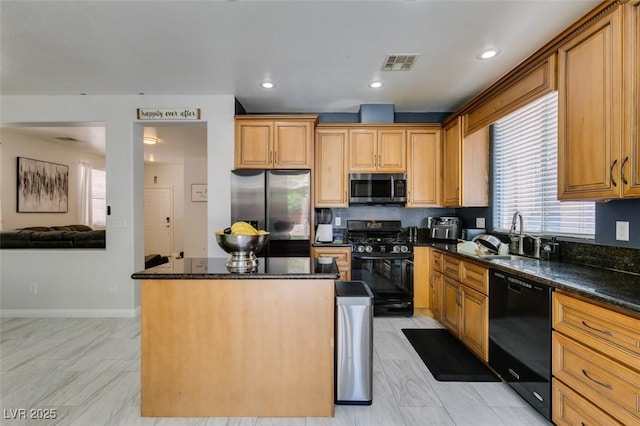 11004 Napa Ridge Dr, Las Vegas, NV 89144 - kitchen with black appliances, a kitchen island, a sink, dark stone counters, and open floor plan