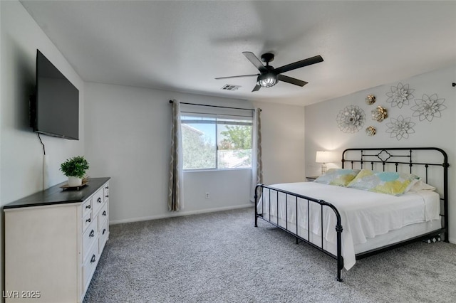 11004 Napa Ridge Dr, Las Vegas, NV 89144 - bedroom with light carpet, baseboards, and a ceiling fan