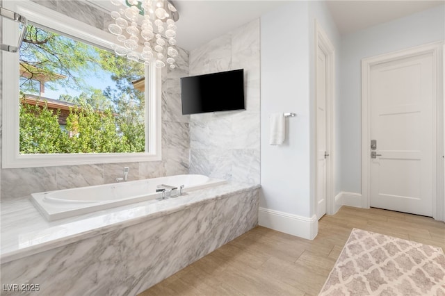 11 Misty Peaks Ct, Las Vegas, NV 89135 - full bath featuring a garden tub, wood finished floors, and baseboards