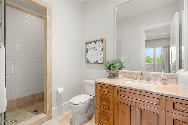 11 Misty Peaks Ct, Las Vegas, NV 89135 - bathroom featuring a stall shower, vanity, toilet, and tile patterned flooring